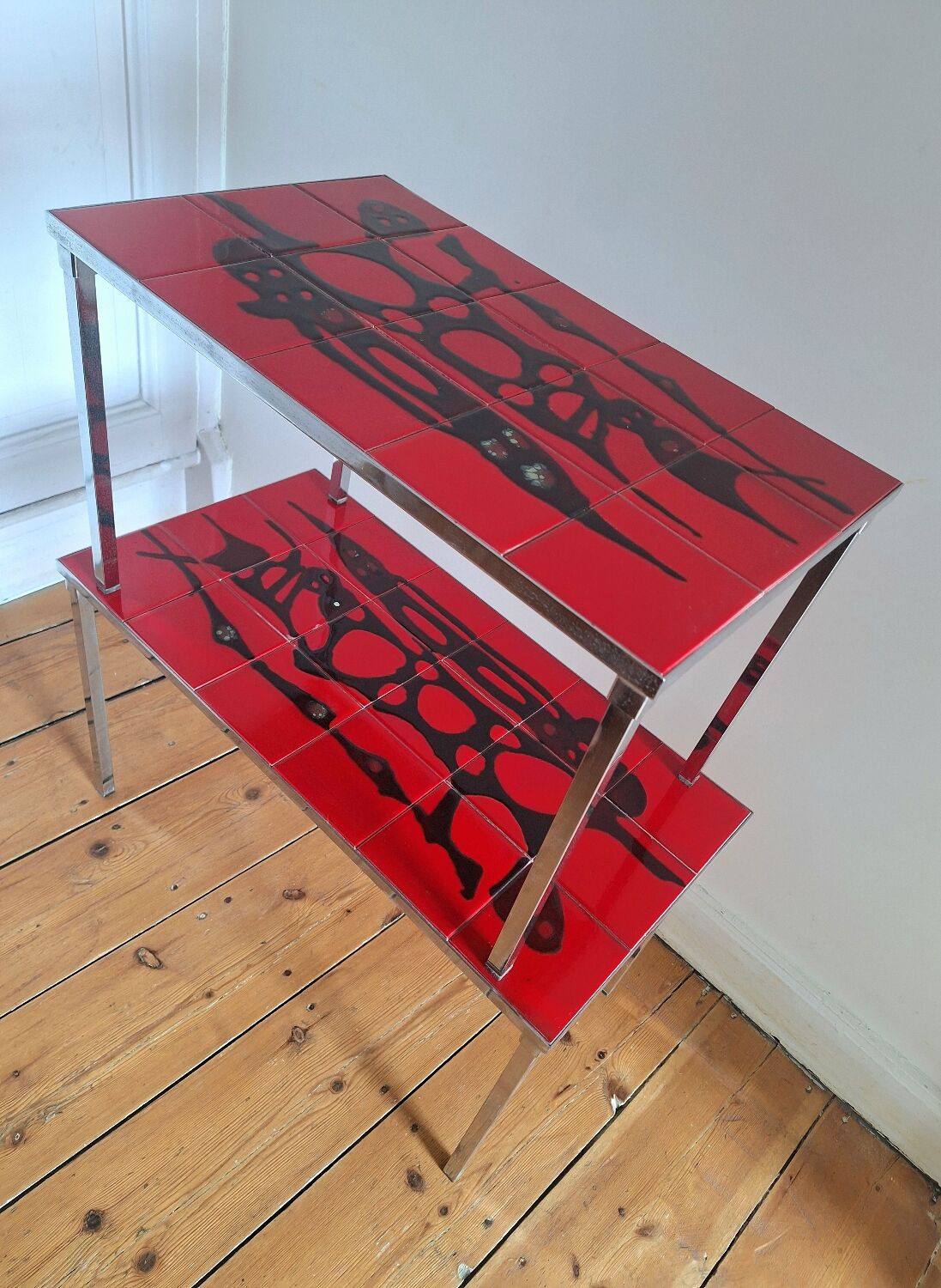 Pair of nesting coffee tables, vintage ceramic furniture.