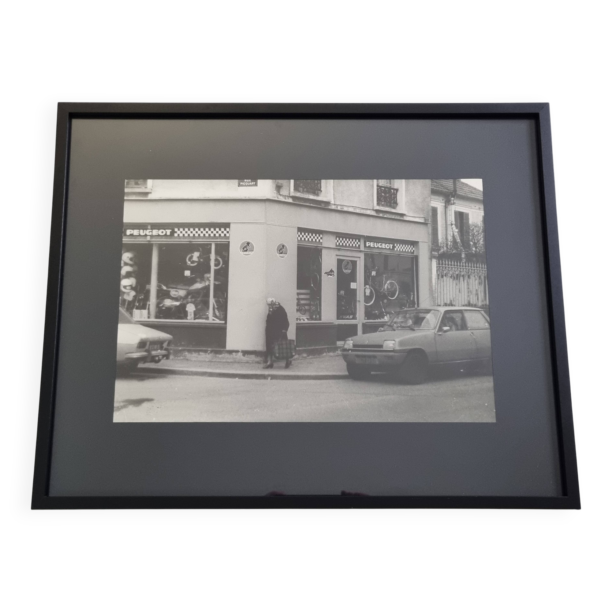 Vintage silver gelatin print of a street scene in a shop window, 1970s, framed, 52 x 42 cm