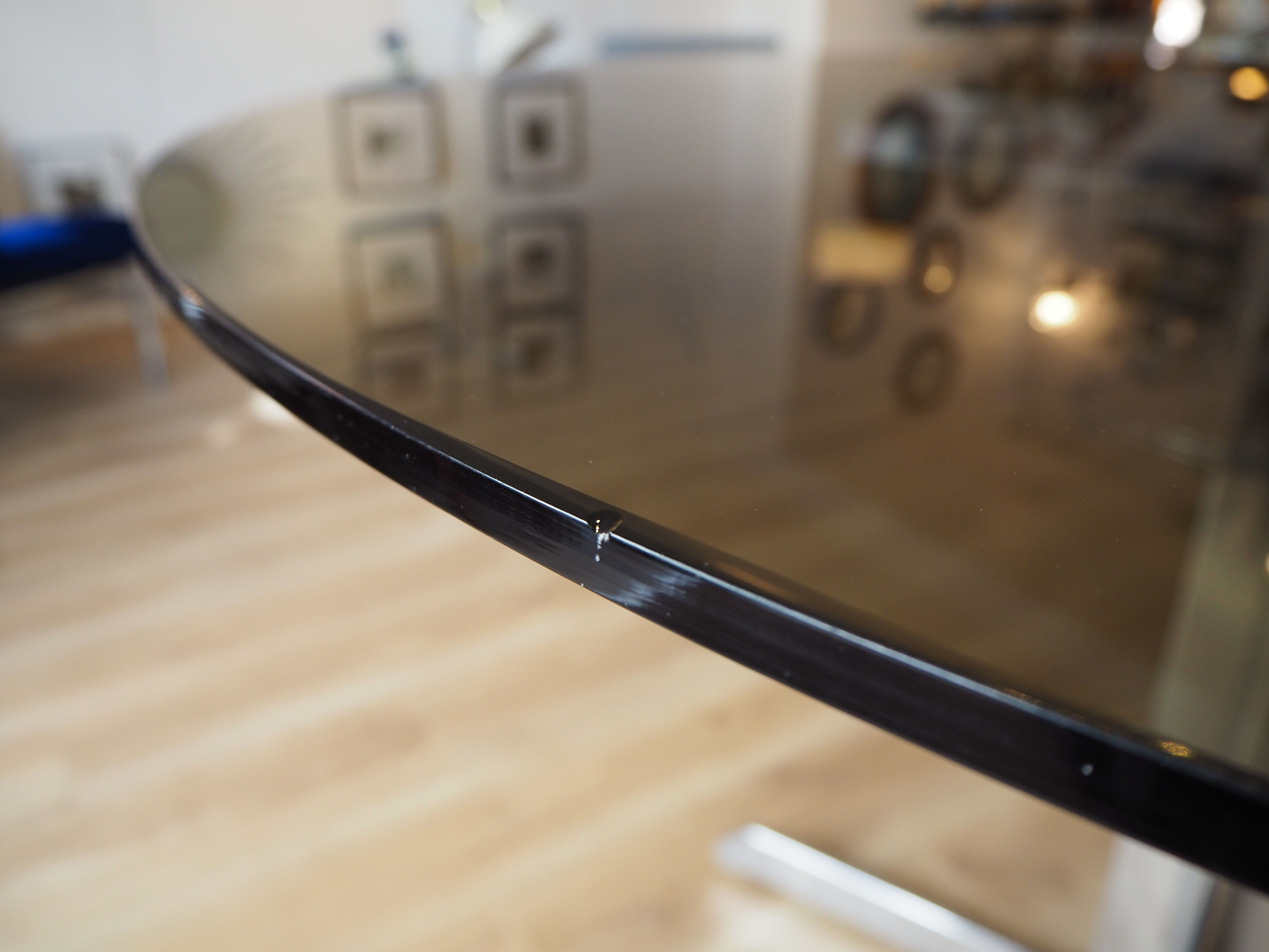 Smoked glass round dining table