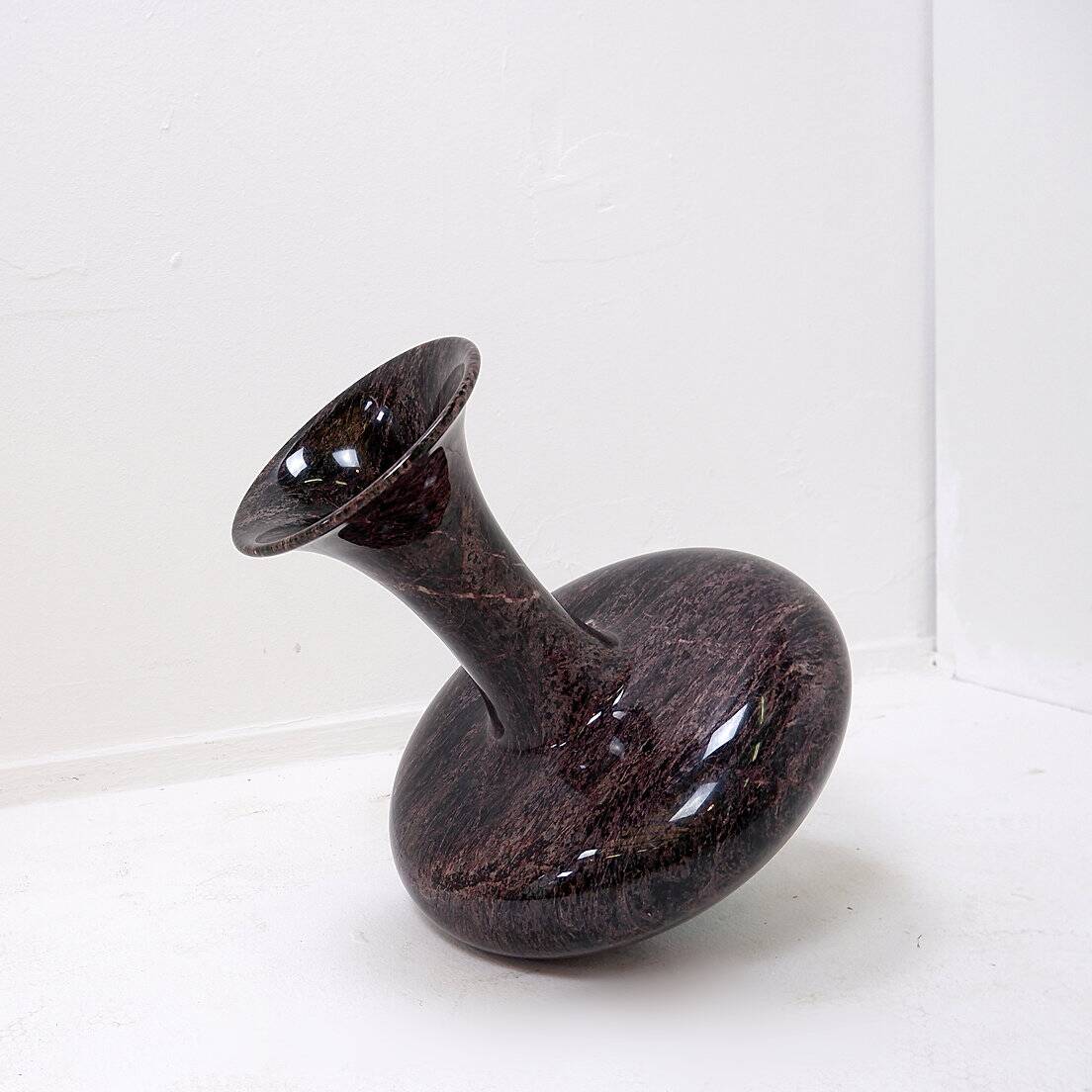 Polished granite vase