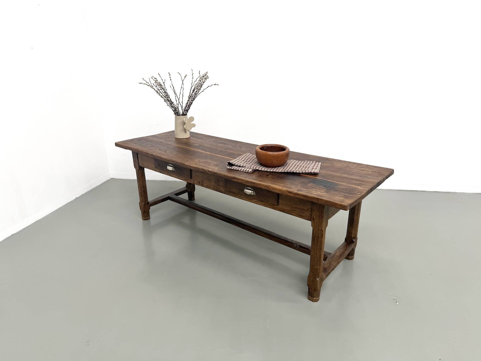 Authentic French farmhouse table from 1890 in solid oak with two drawers.