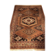 Wool carpet with oriental decoration on a brown background