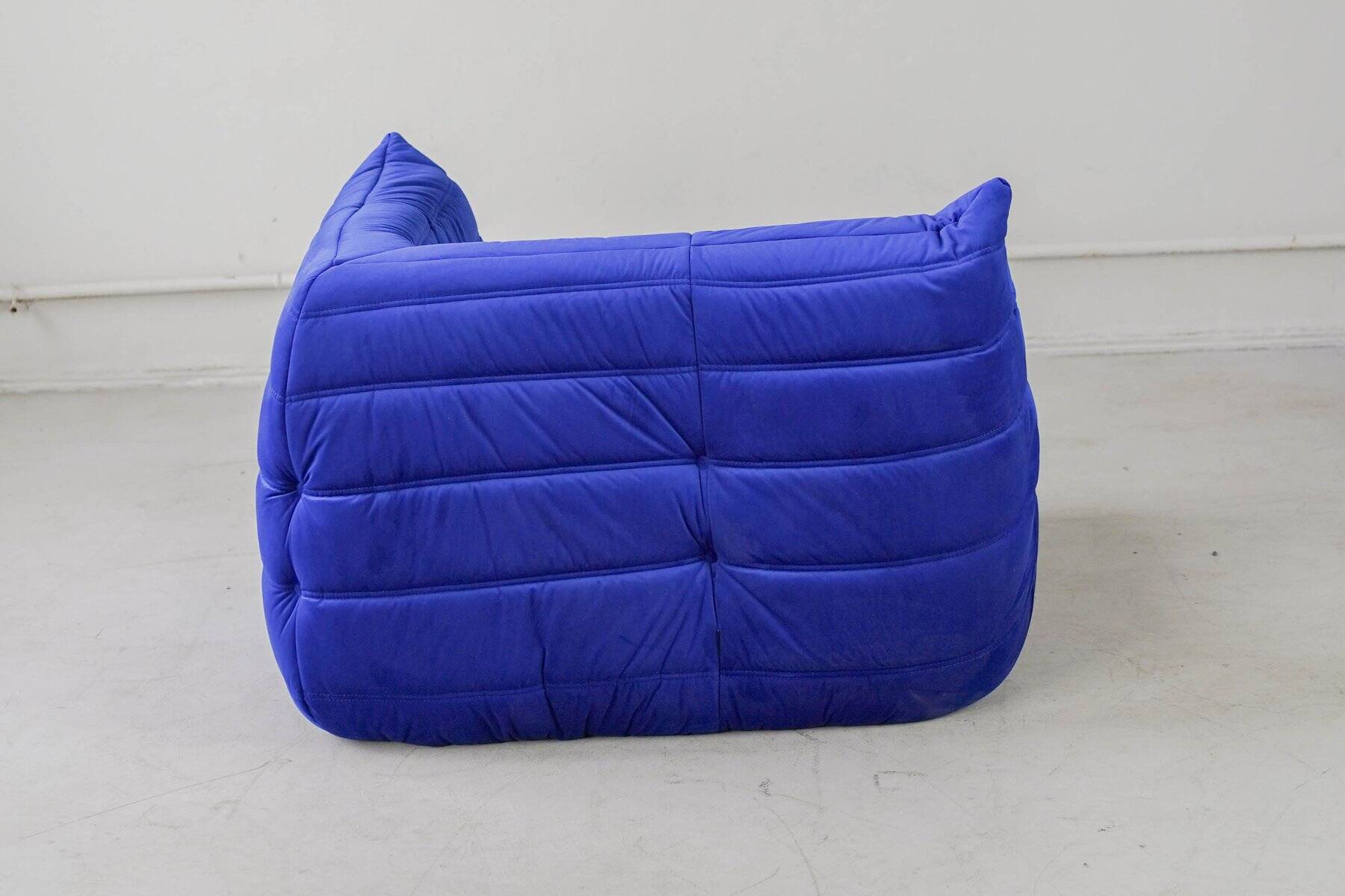 Togo corner chair in blue velvet by Michel Ducaroy for Ligne Roset
