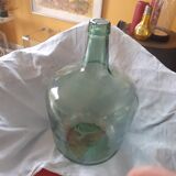 2 demijohn in light green glass.