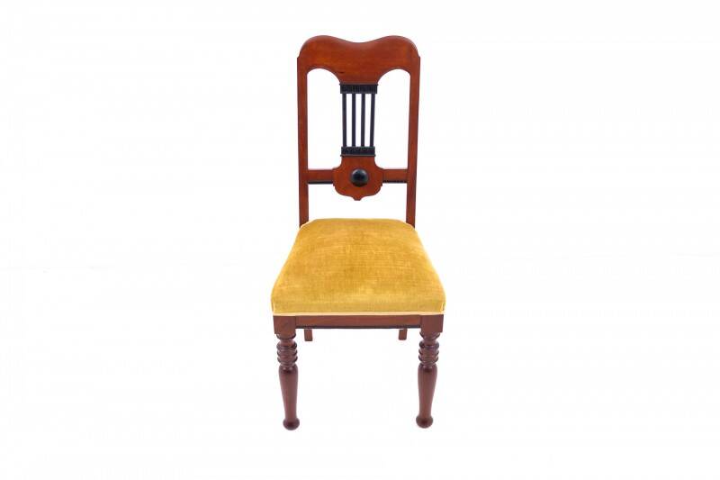 Table with four chairs from the early 20th century