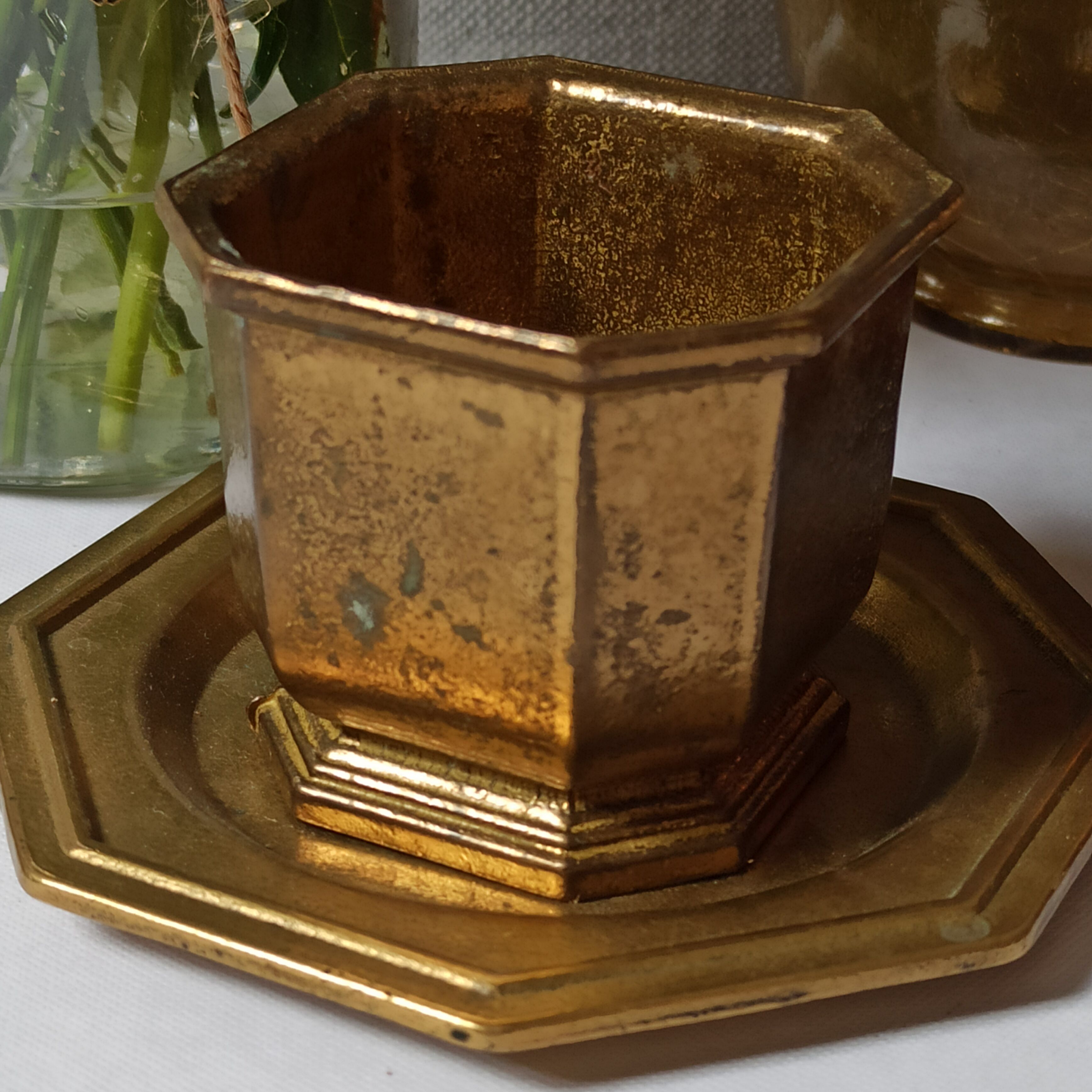 Varnished brass pot on saucer from the 80s