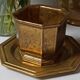 Varnished brass pot on saucer from the 80s