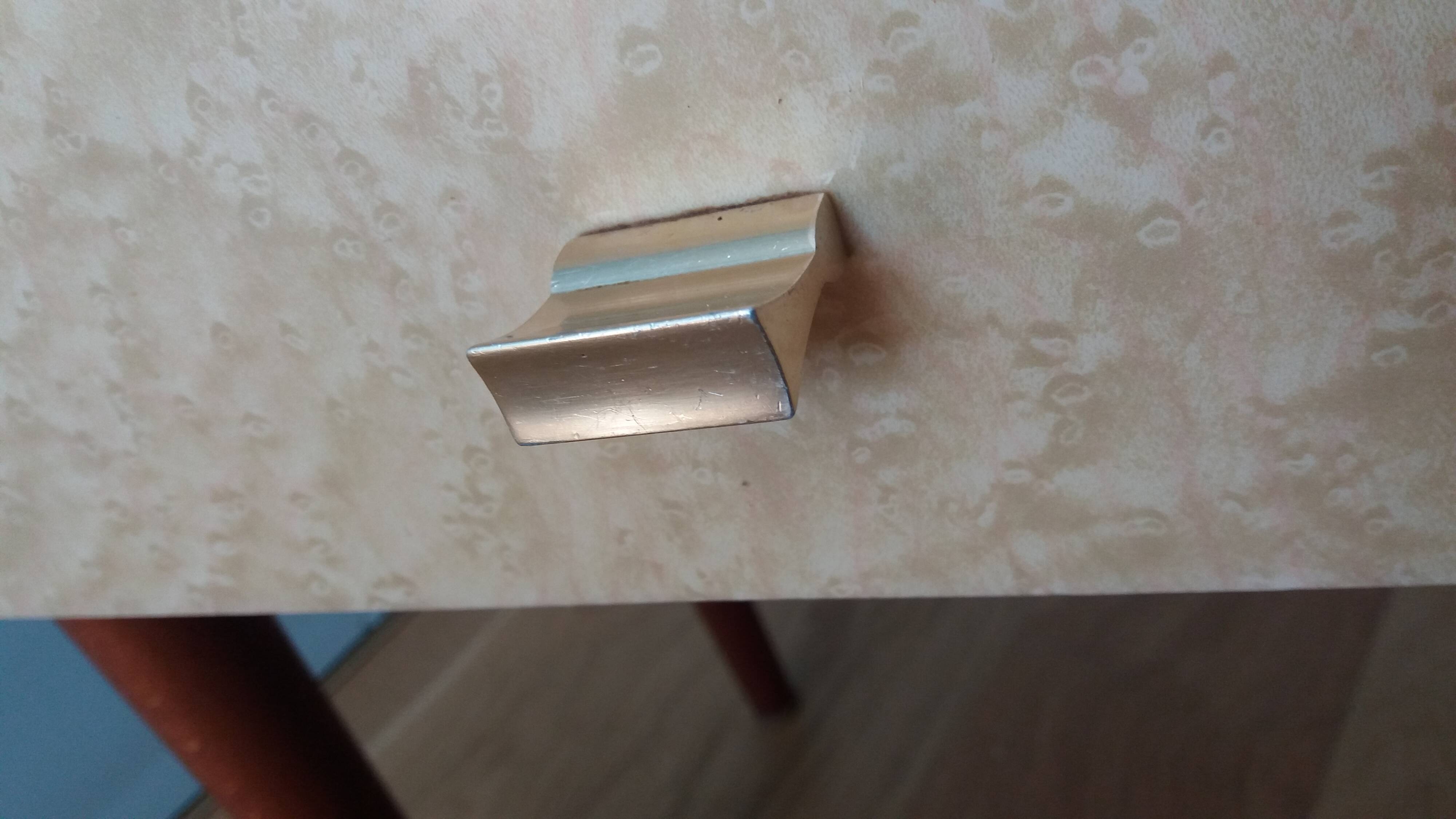 Spindle-legged bedside table