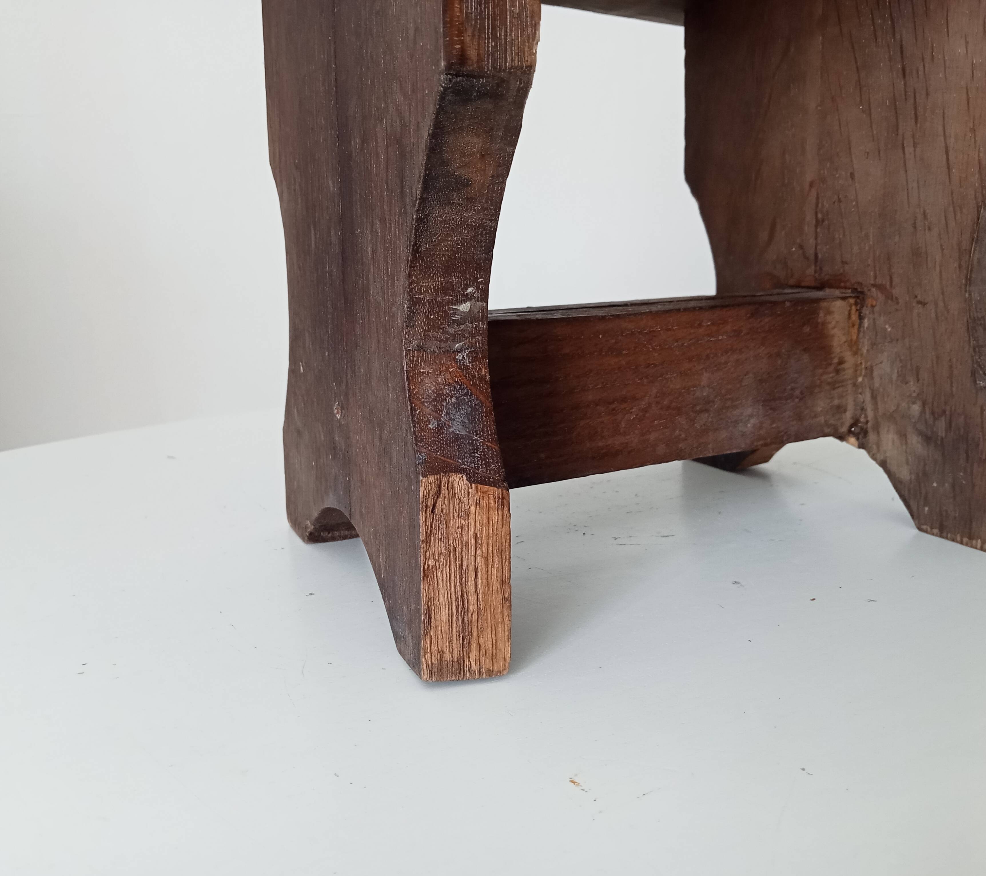 Ancient primitive milking stool