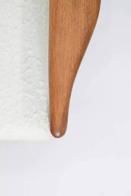 1960s canapé, in teak and white boucle.