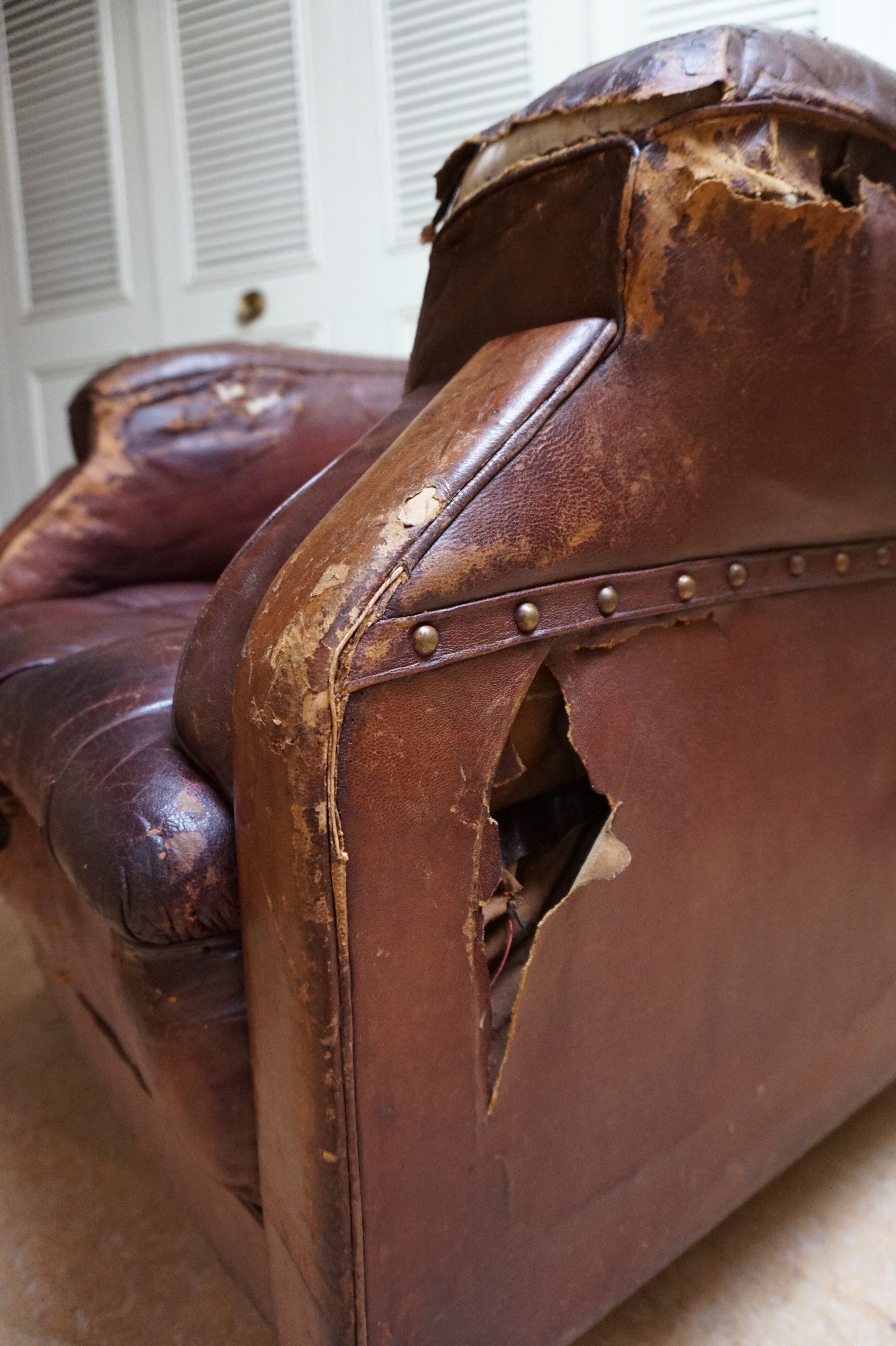 Worn Leather Buttoned Library Fireside Armchair, 1840's