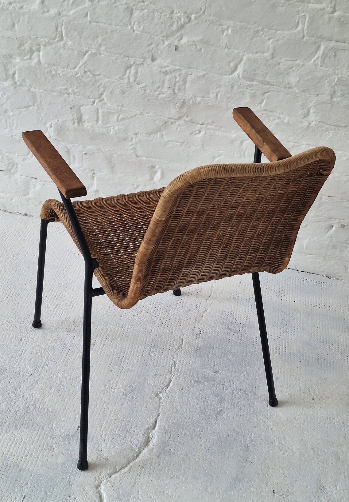 Pair of Swiss stackable rattan and iron dining elbow chairs, G Legler 1960s