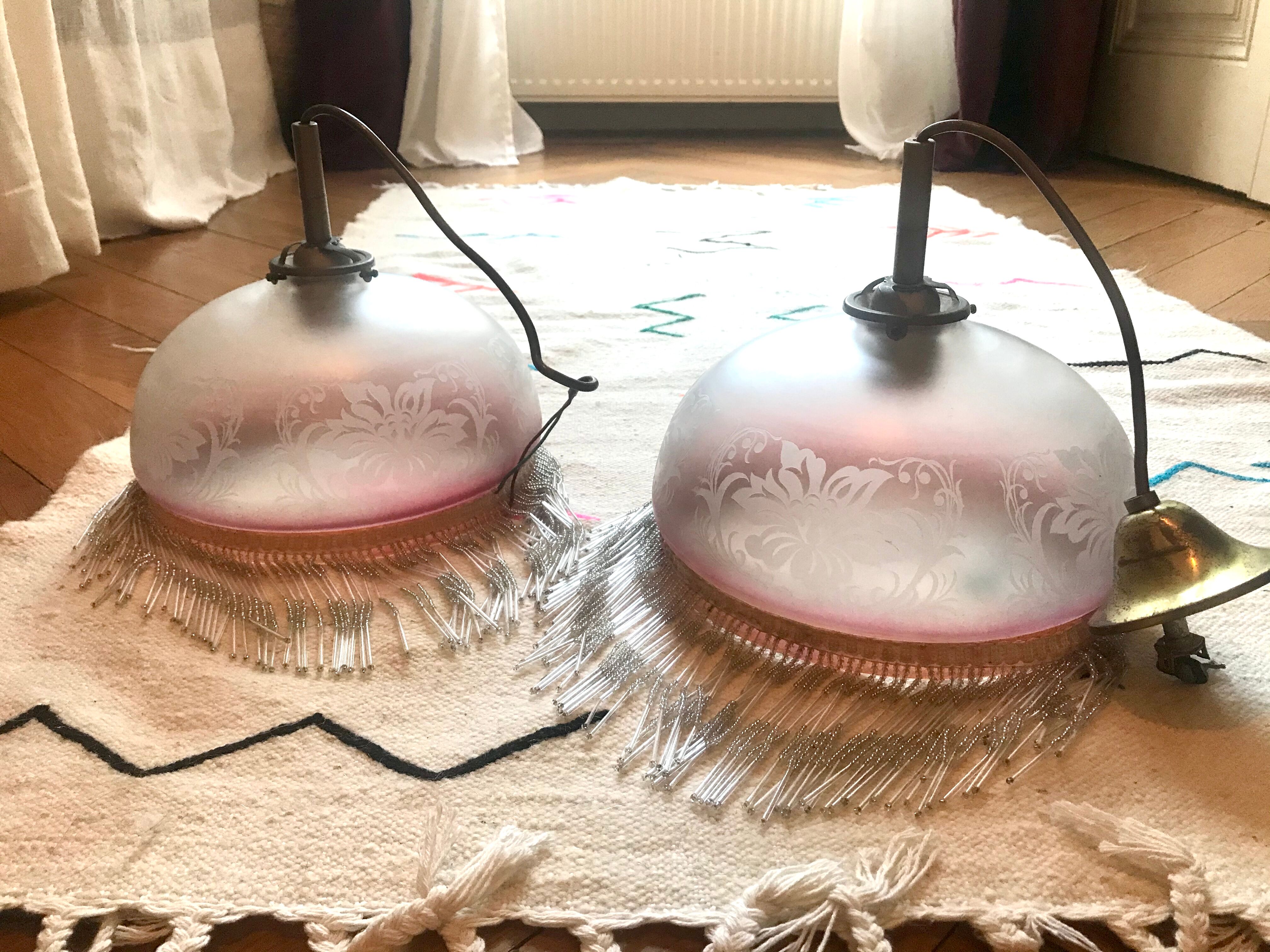 Hanging glass and stamps