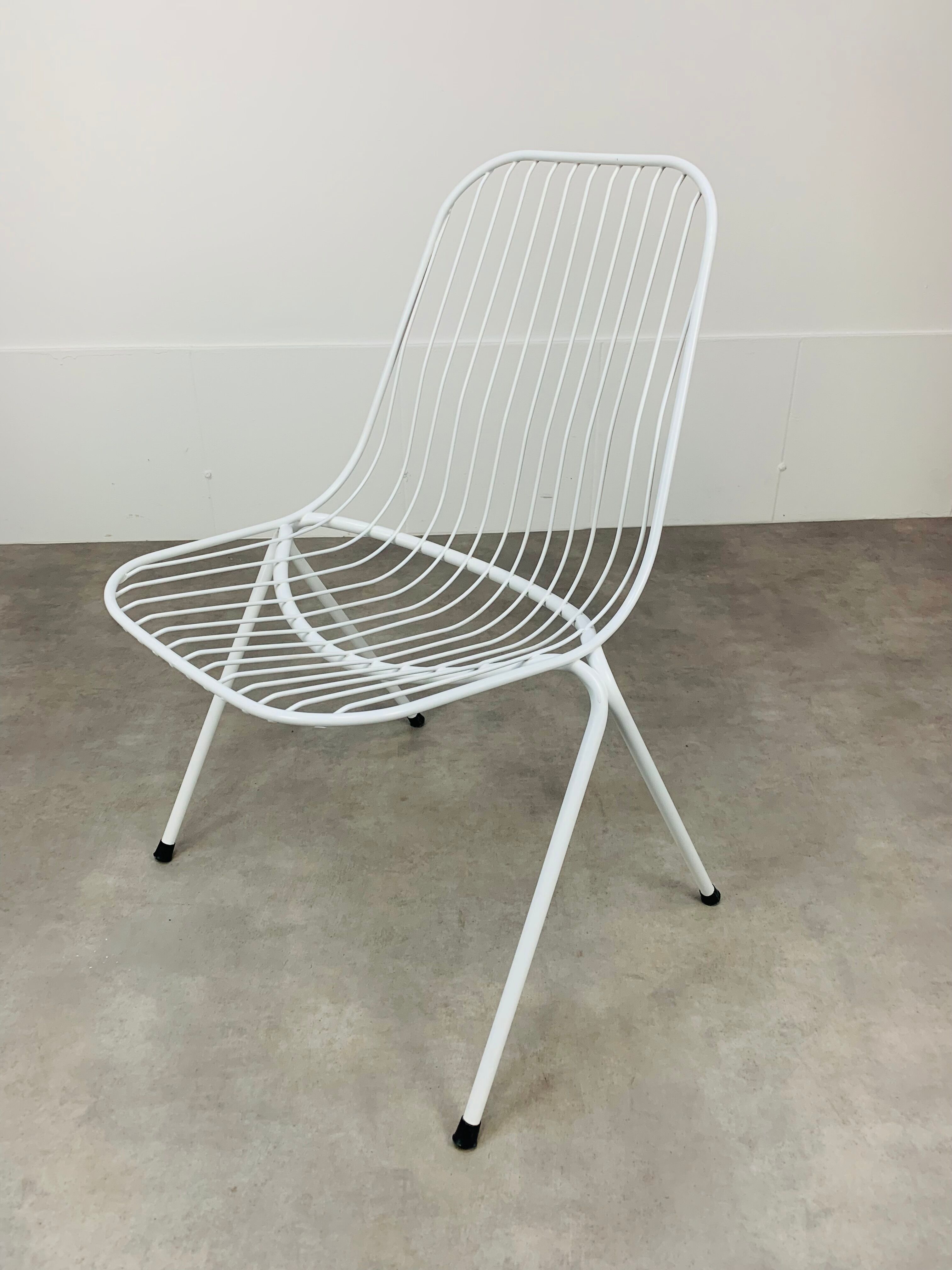 Pair of 50s steel wire chairs by Stella