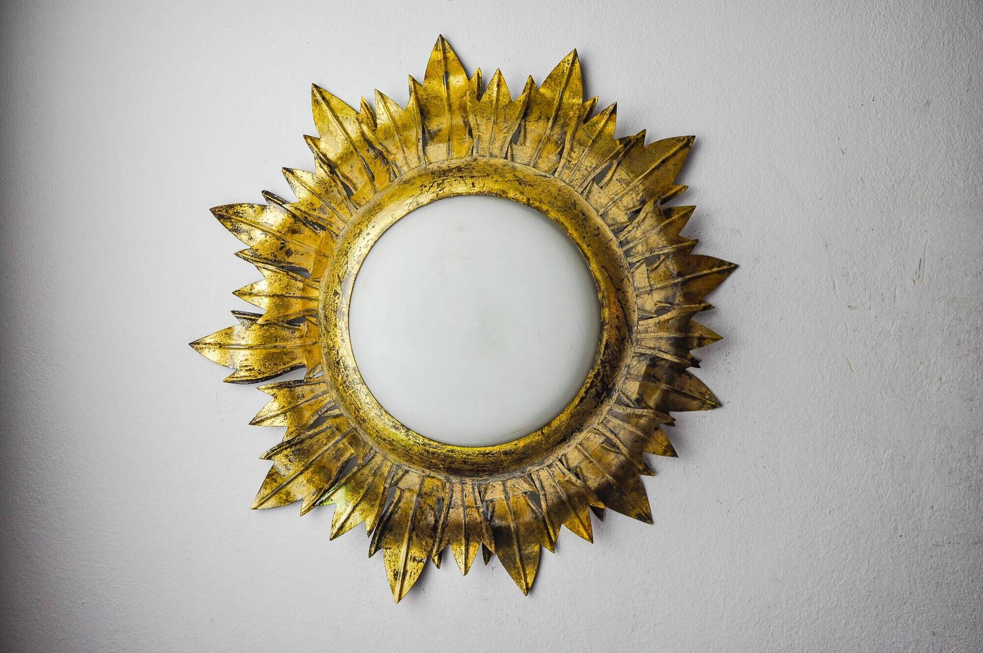 Sun wall lamp by ferro arte, metal and gold leaf, Spain, 1960