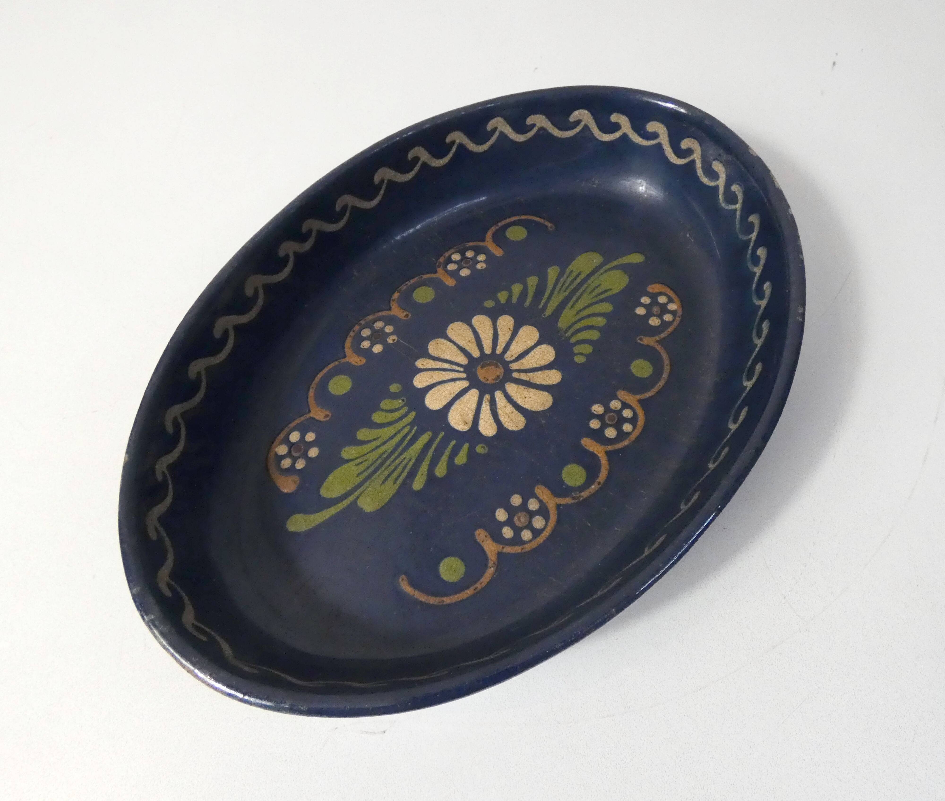 old glazed terracotta dish