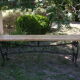 Pairs of benches in light wood and tubular metal