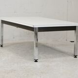 Coffee table chrome steel base, white melaminate top. France, circa 1970.