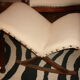 Armchair and its footrest