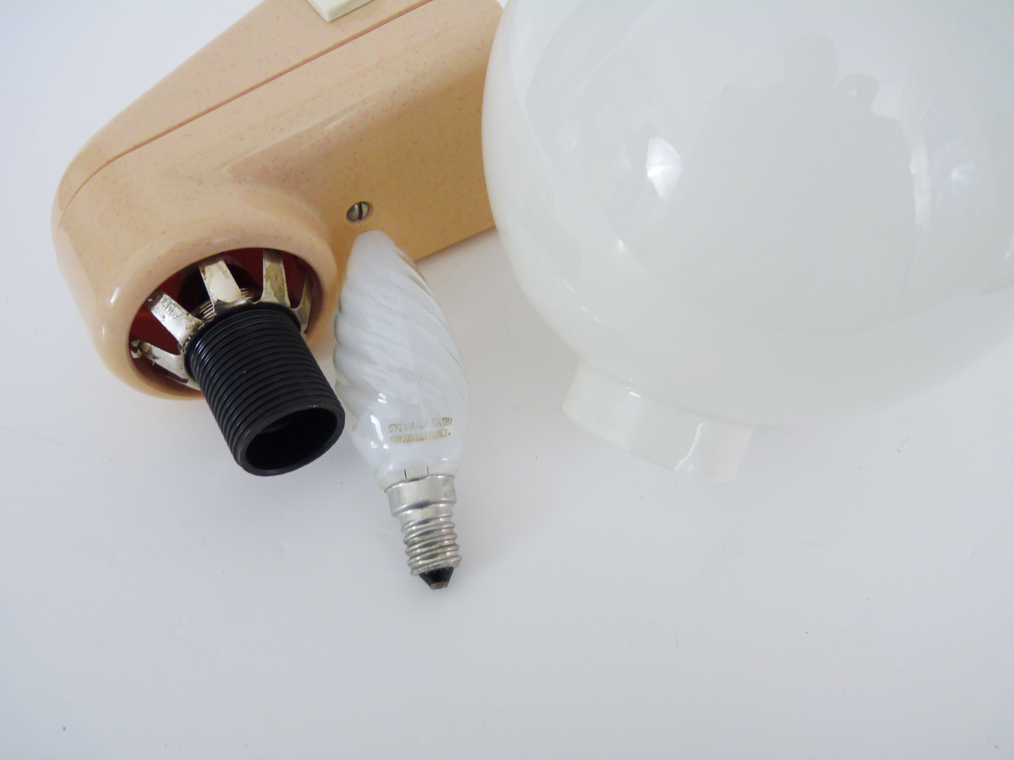 Vintage wall lamp in beige pvc with pink dot and globe in white opaline. Year 70