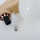 Vintage wall lamp in beige pvc with pink dot and globe in white opaline. Year 70