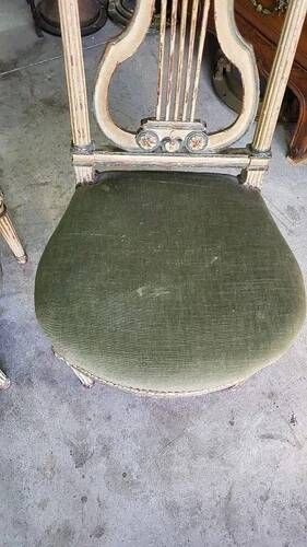 Pair of Louis XVI style chairs from the 18th century with lyre back.
