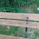 Antique garden bench with cast iron legs