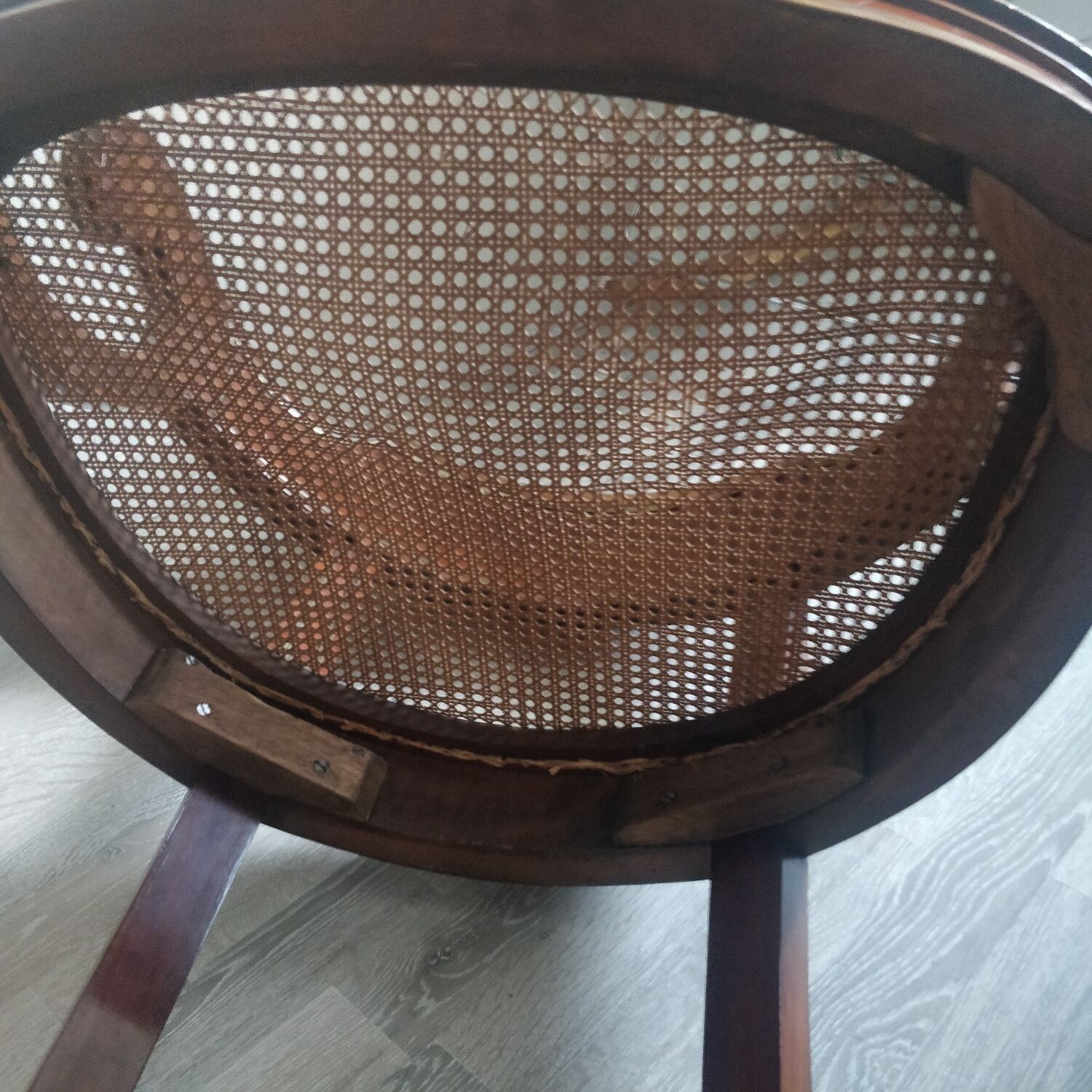 Armchair with canework and bronze detail