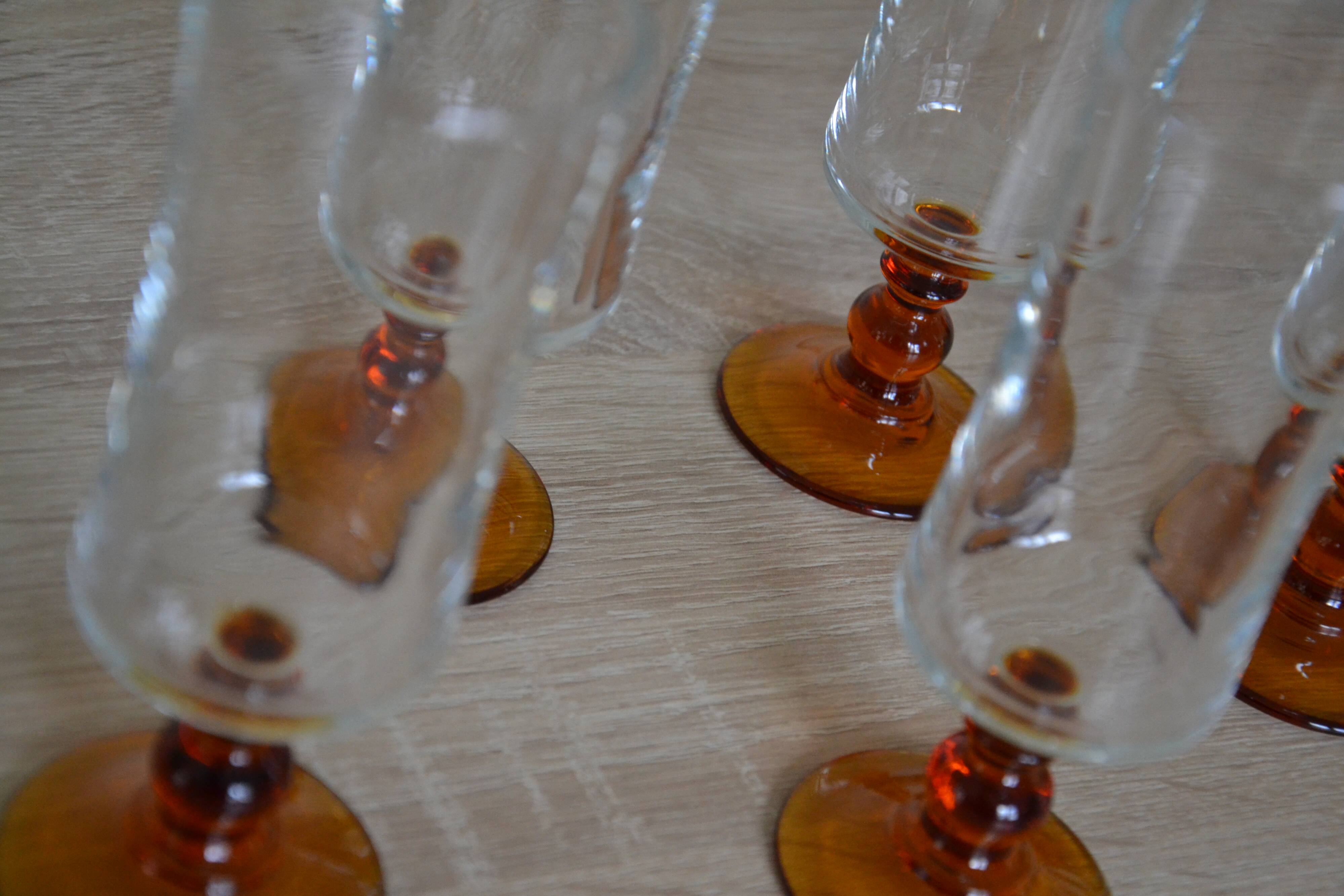 Champagne glasses with amber stems