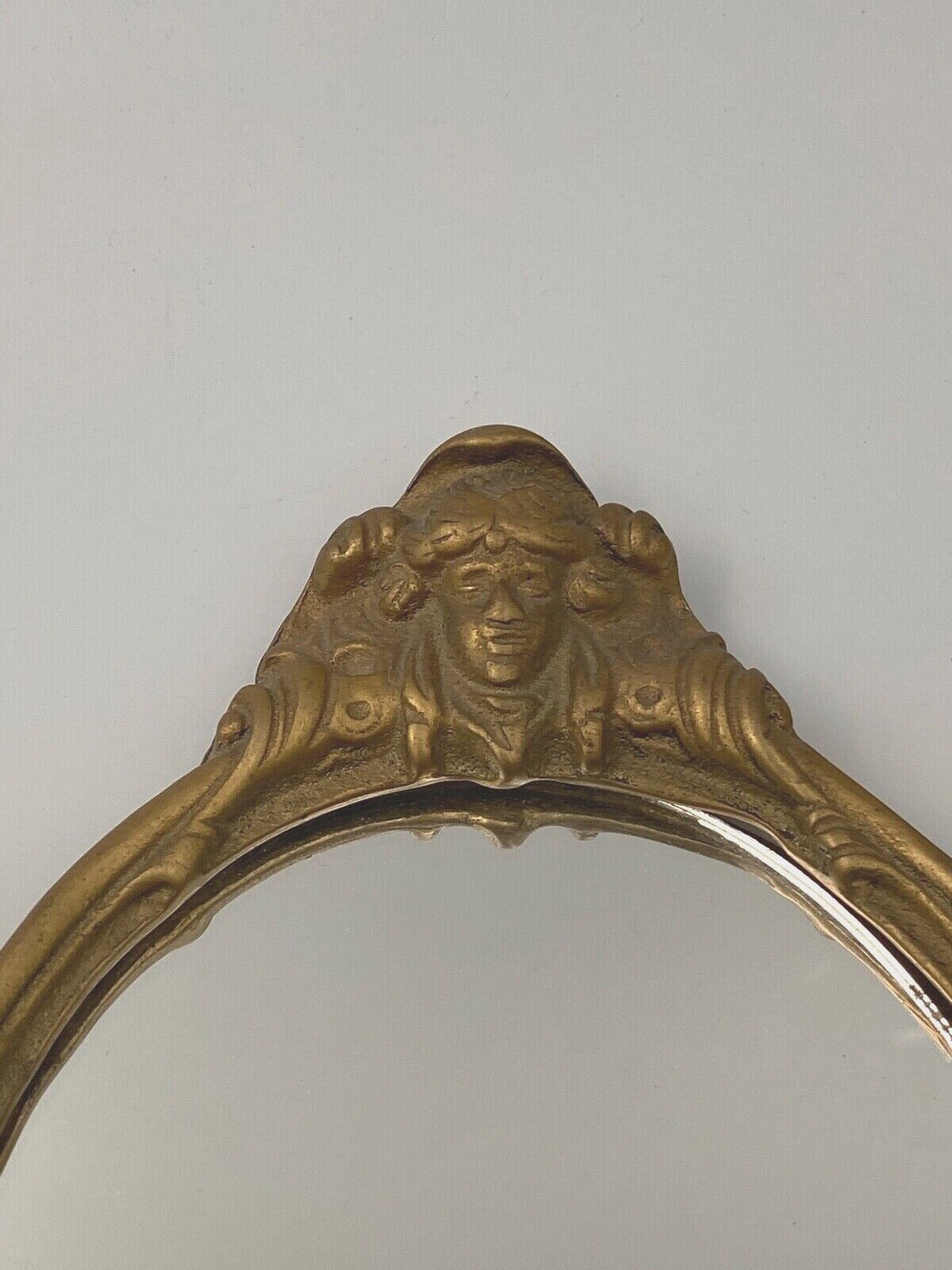 Bronze hand face of the middle XXe decor d'angelot