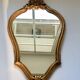 Miroir rocaille bois sculpté et doré 30x45cm