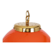 Orange glass pendant light by Peill Putzler, Germany, 1970.