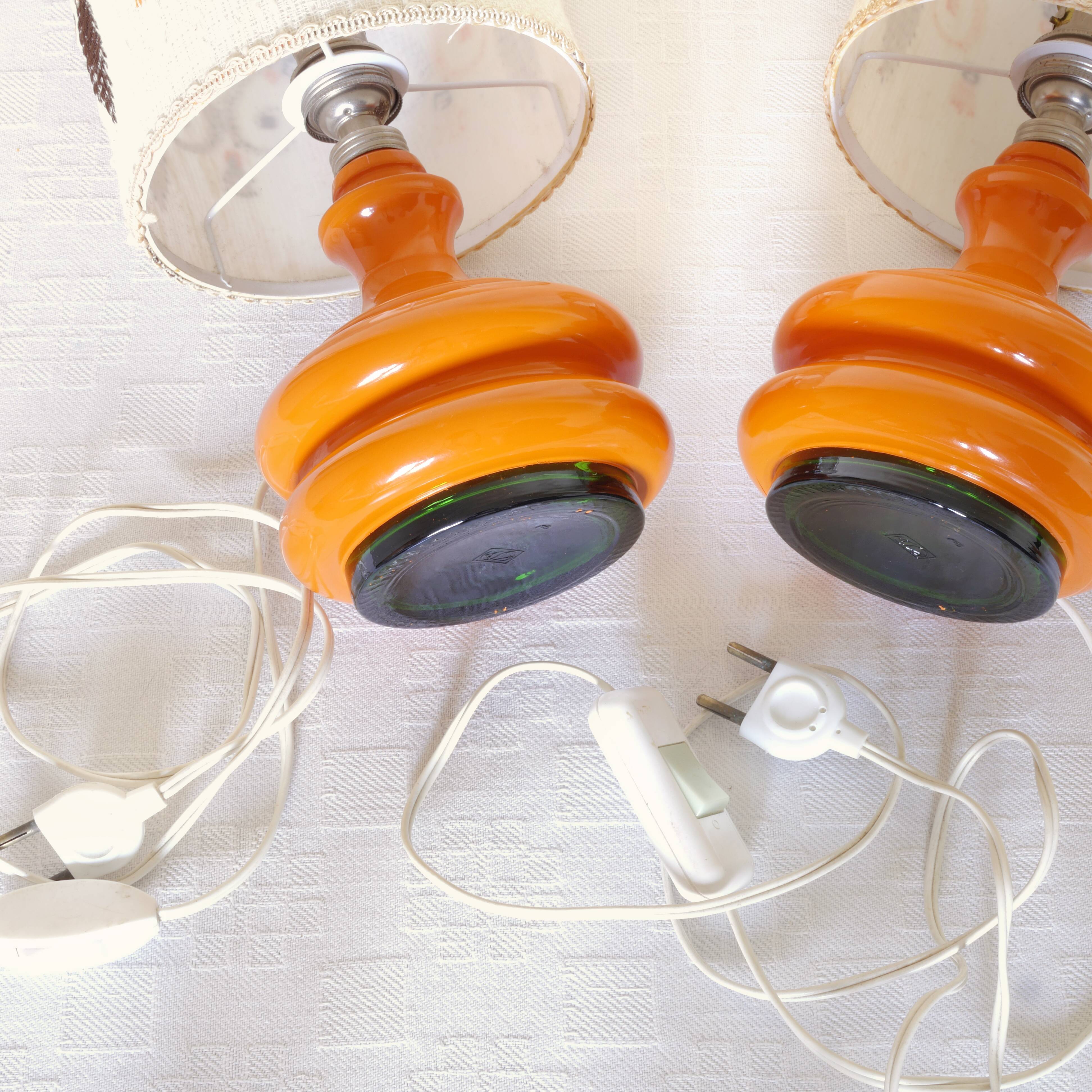 Pair of embroidered orange lamp