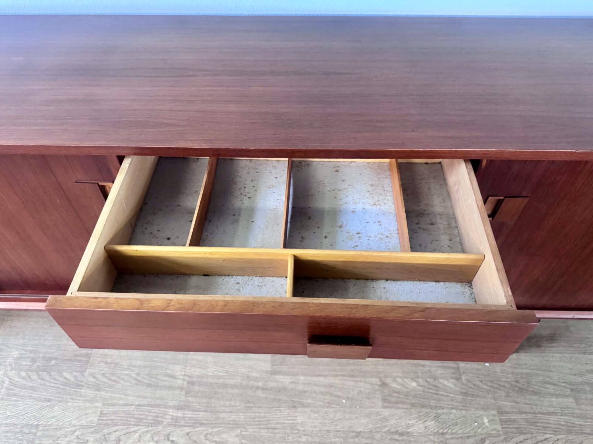 Scandinavian teak sideboard, 230 cm long, with 3 doors and 4 drawers.
