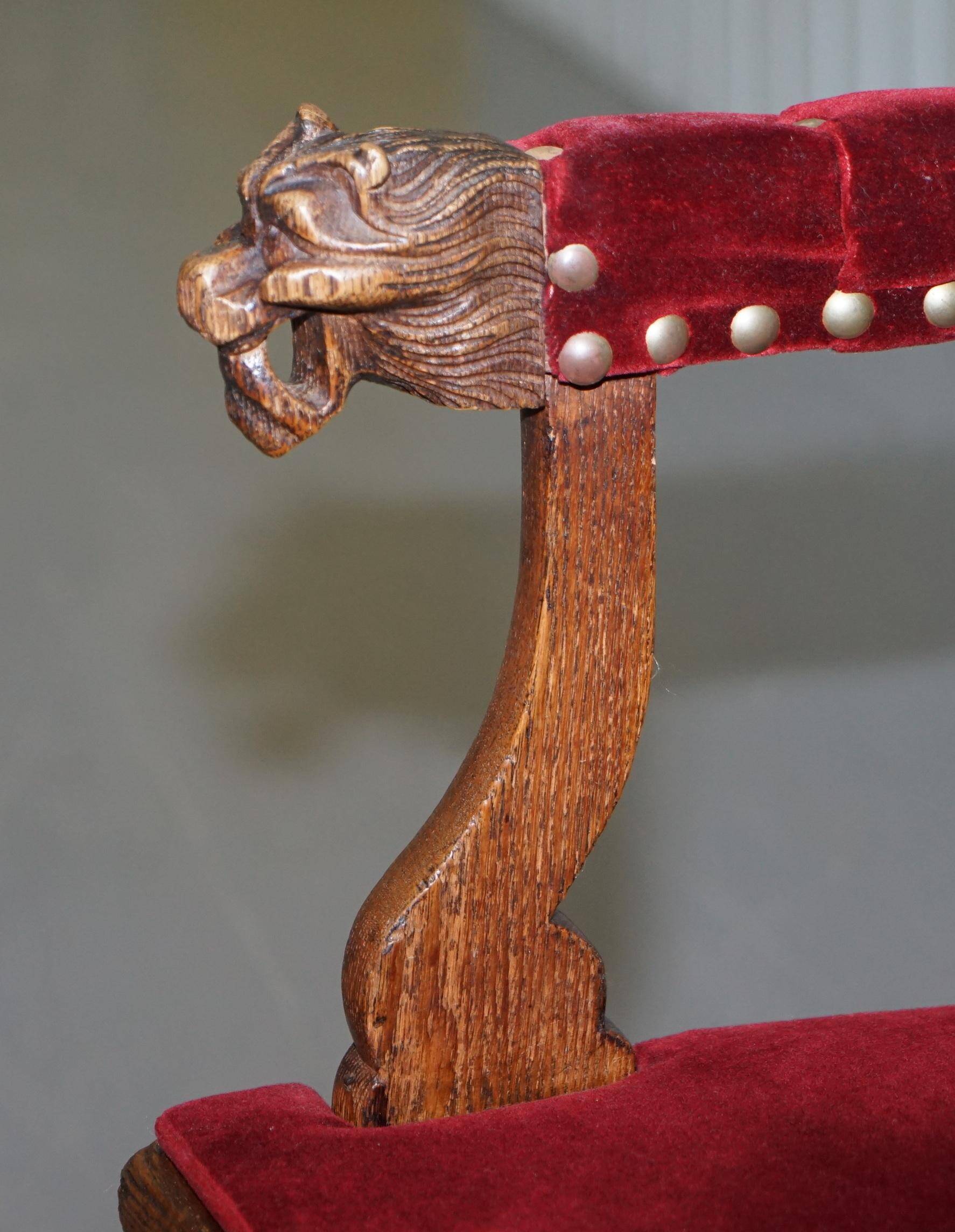 Antique Régence Bergère Armchair in Carved Oak with Lion Head Armrests