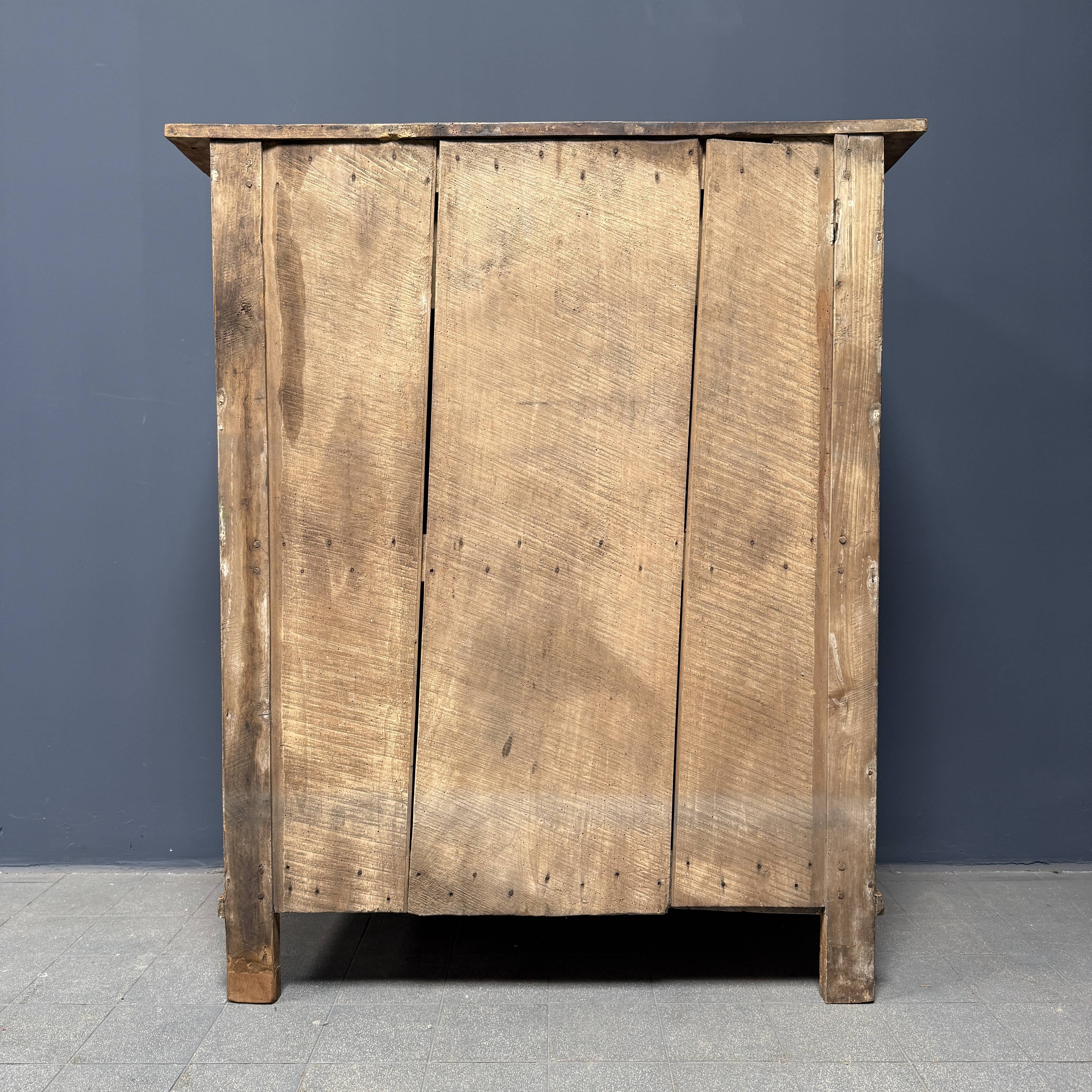 Old marbled ochre yellow French farmhouse cabinet