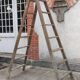Old wooden stepladder stamped