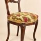 Carved walnut Napoleon III style velvet medallion chair
