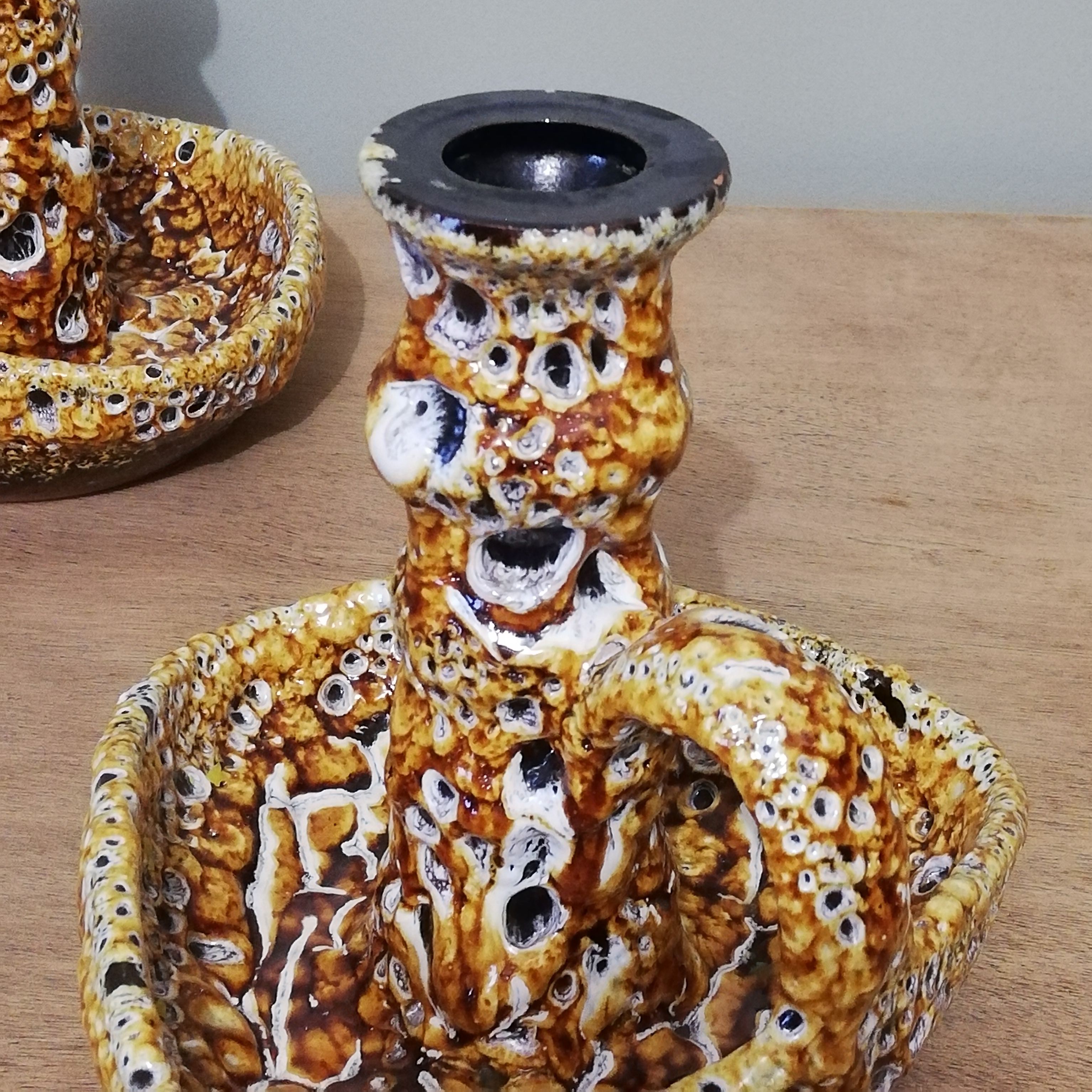 Pair of honey-colored Fat Lava ceramic candle holders