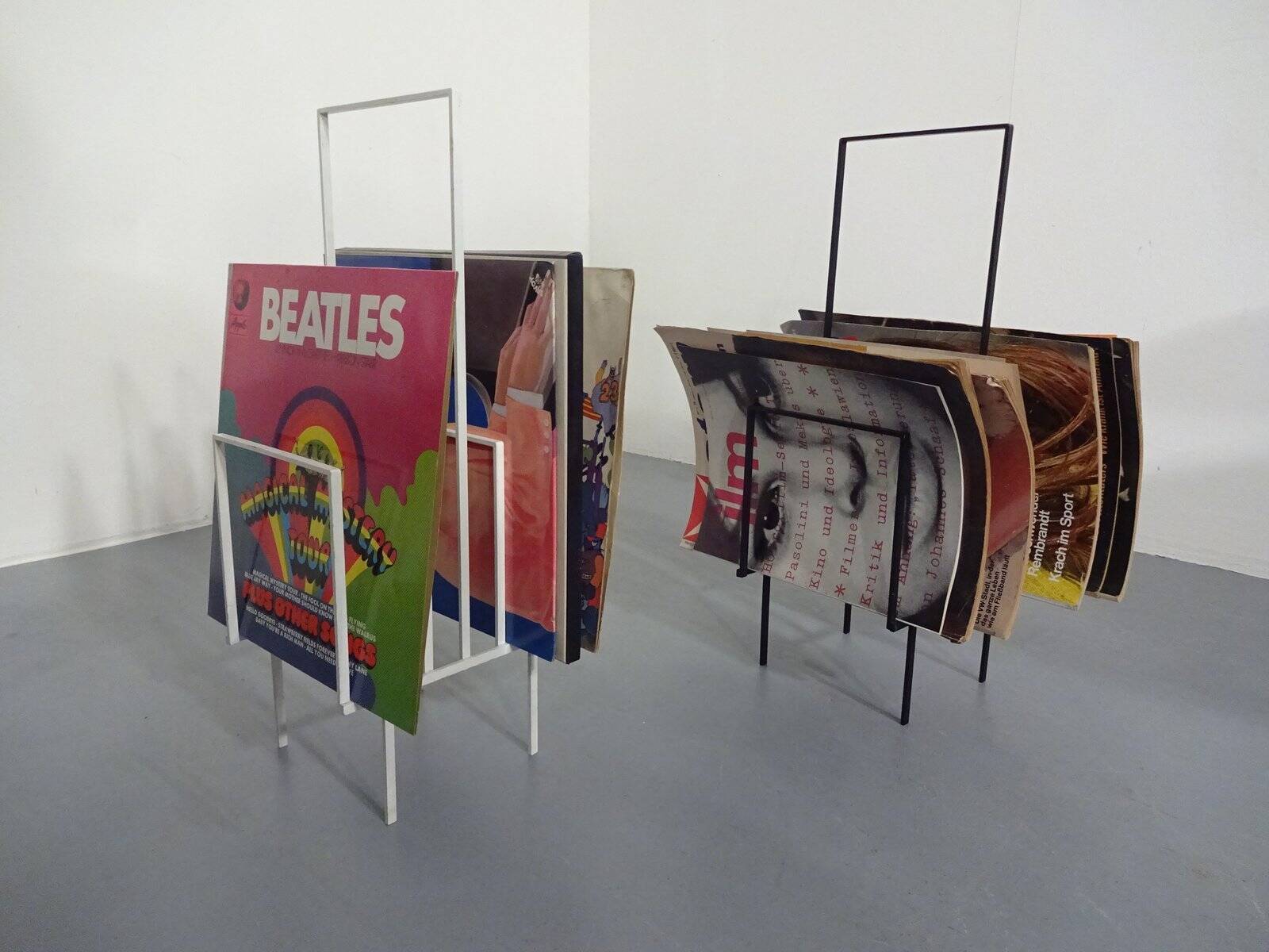 Steel magazine or record racks, 1960s, set of 2