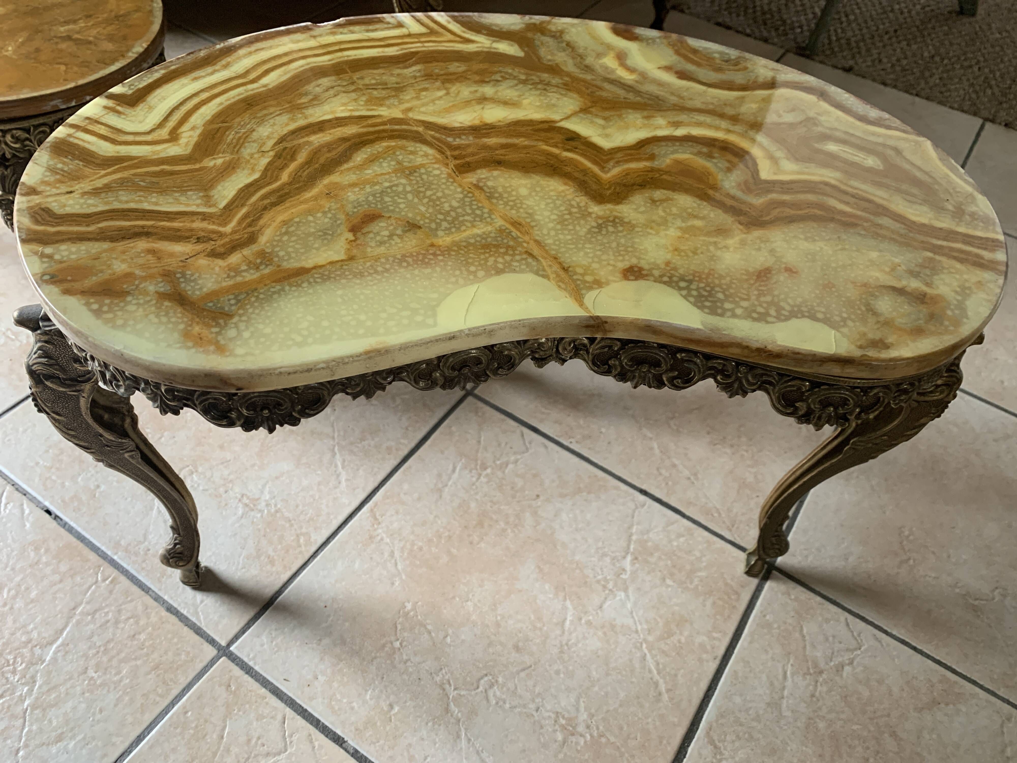 Lot of 3 marble and brass nesting tables.