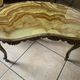 Lot of 3 marble and brass nesting tables.
