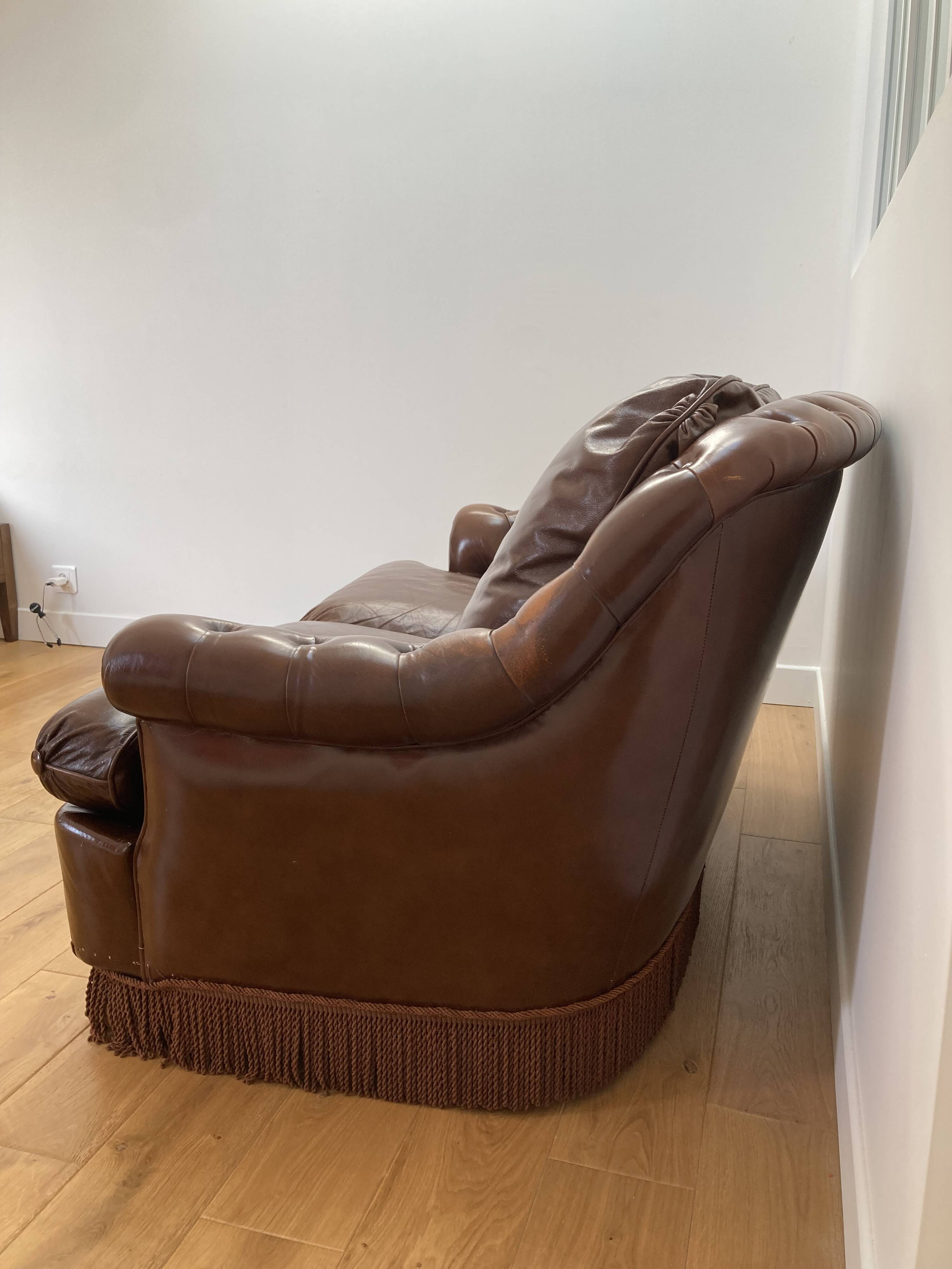 Chesterfield leather sofa with fringes