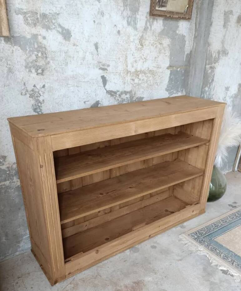 Open wooden chest of drawers