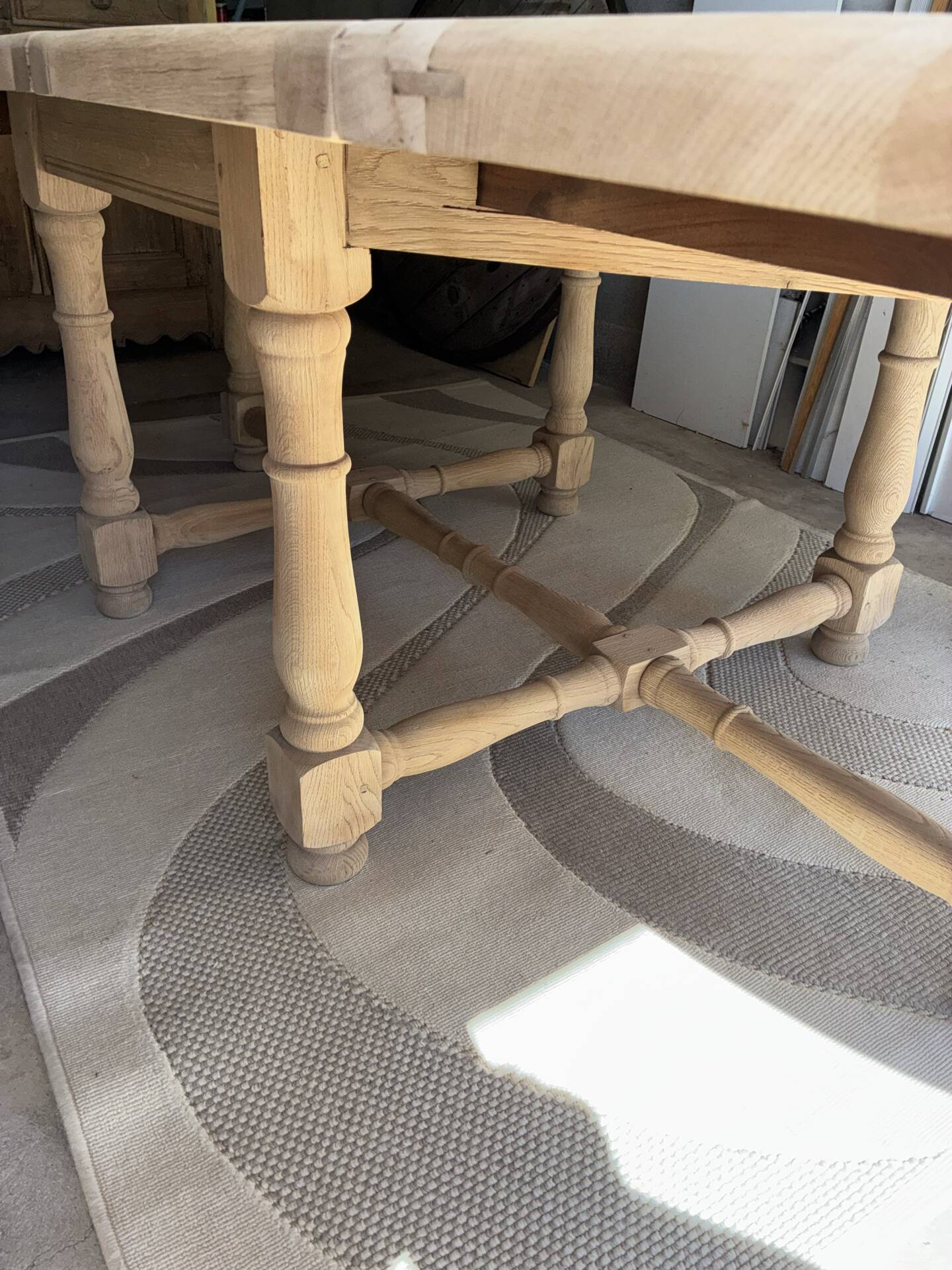 Solid oak farmhouse table with extensions.