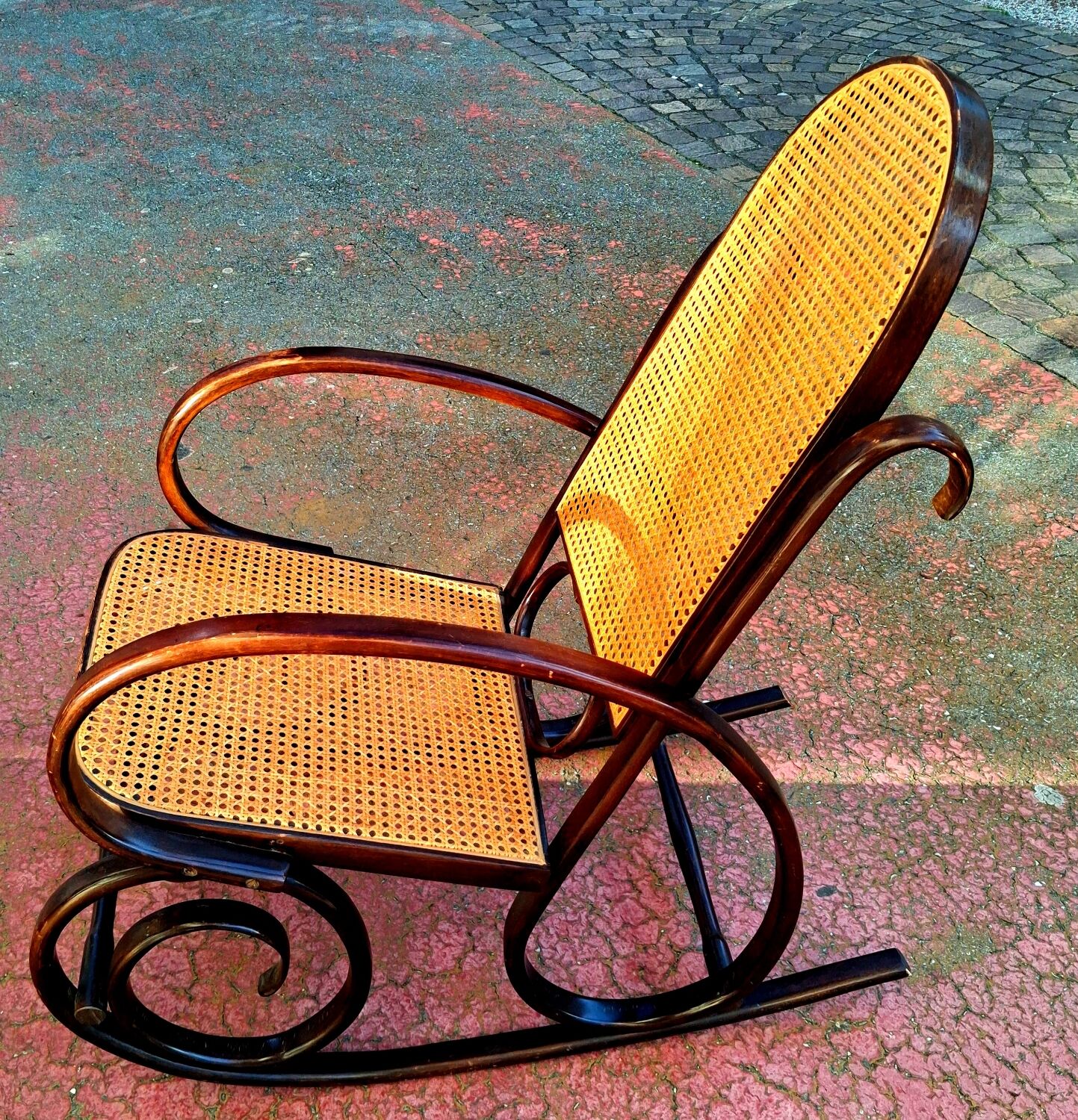 Rocking chair. Bent wood and cane.