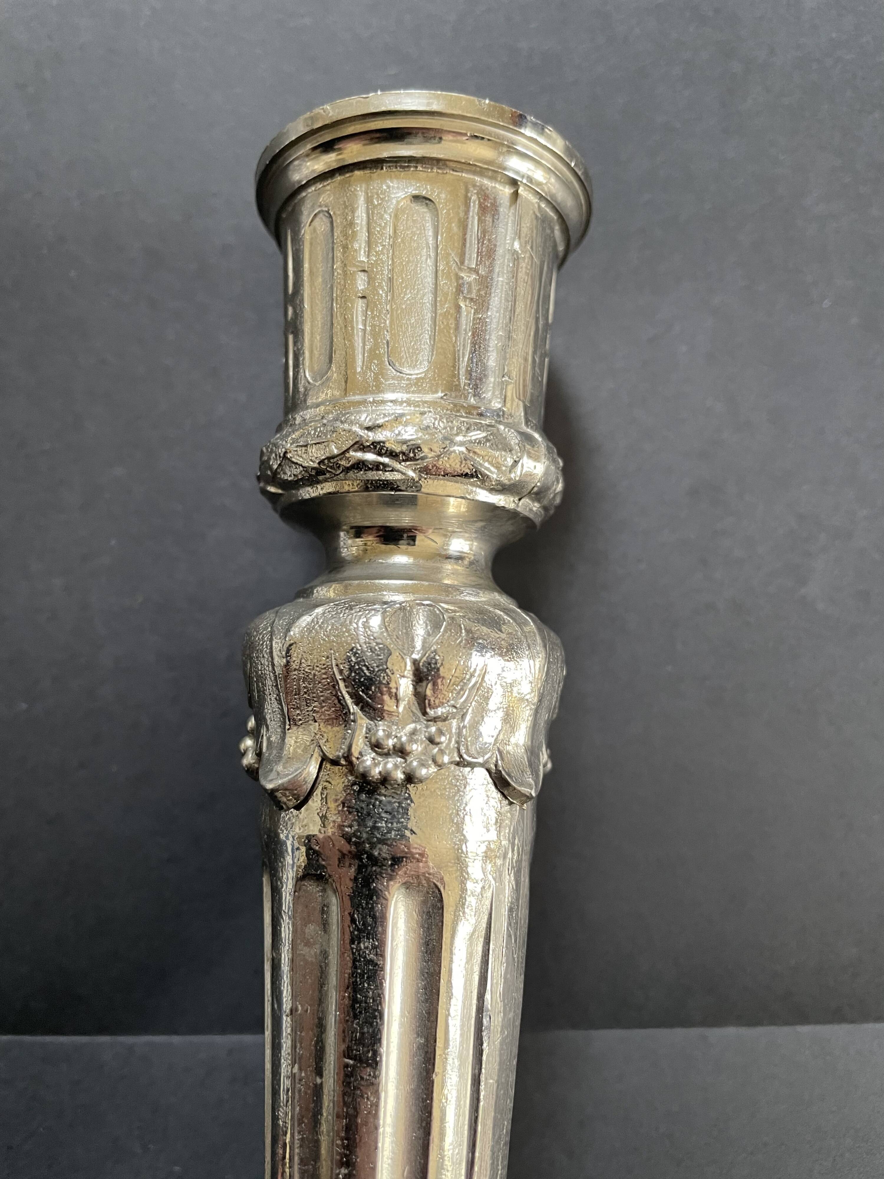 Antique silver-plated candlesticks in classic style