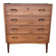 Danish commode from the 1960s in brown teak, with 4 drawers and elegant tapered legs.
