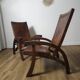 Leather and teak armchairs, by Angel Pazmino, circa 1960.