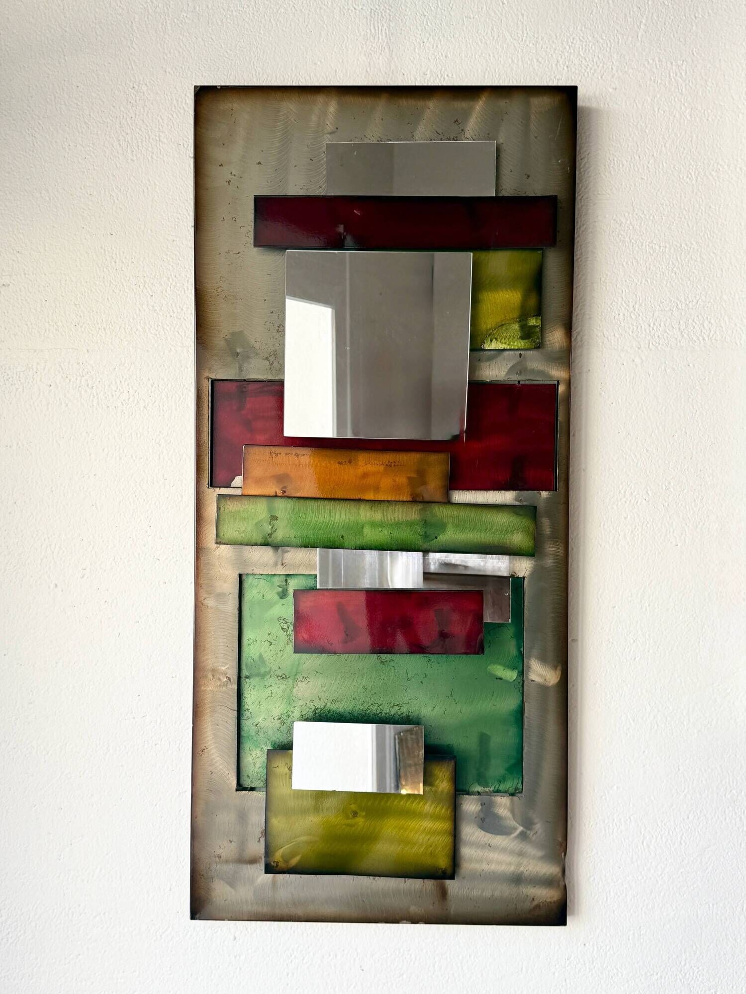 Large metal "polychrome" mirror — 1970s